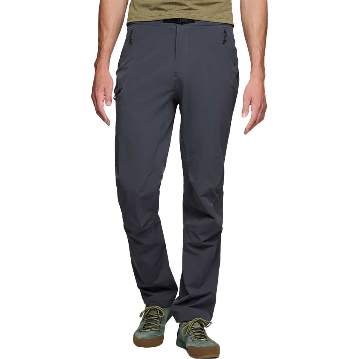 Dark gray pants worn by a person on a white background