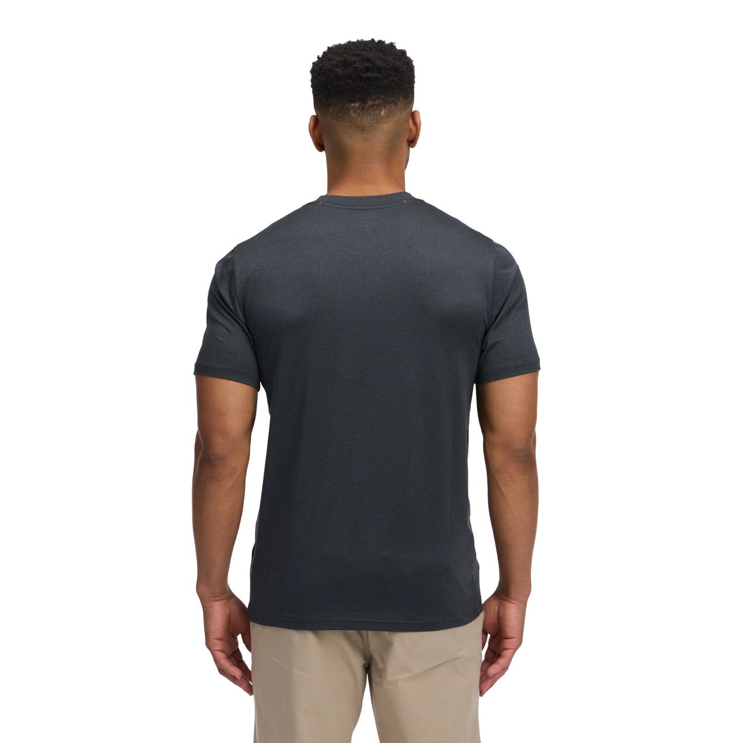 Man wearing a dark gray t-shirt on a white background