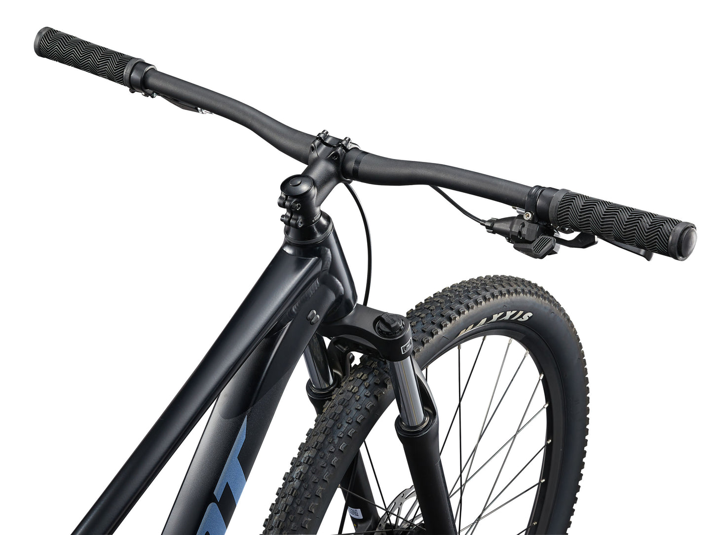 Close-up of a mountain bike handlebar and front wheel on a white background