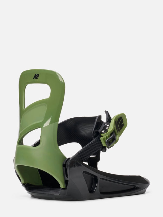 A single snowboard binding shown on a clean, light gray studio background. The binding features a glossy olive green backboard and a black baseplate and straps.