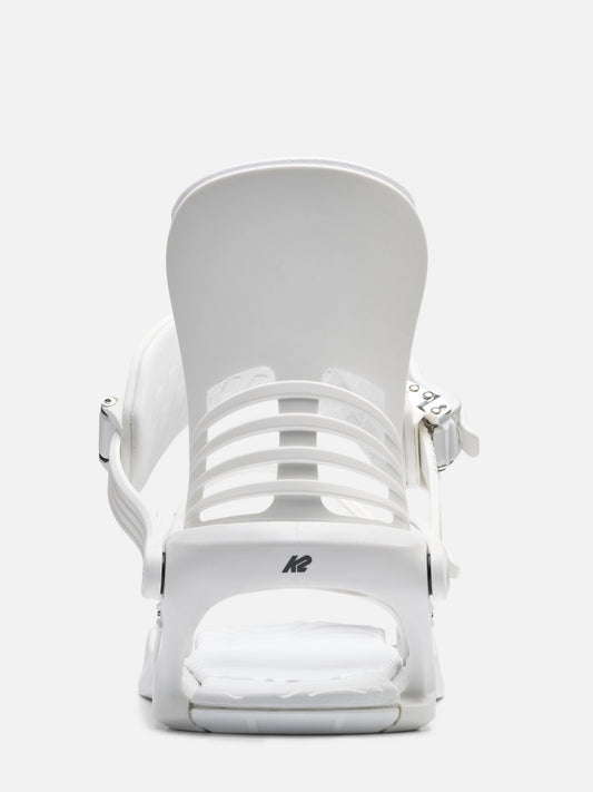 A white snowboard binding shown from the back on a clean, light gray studio background. The brand logo 'K2' is visible on the base.