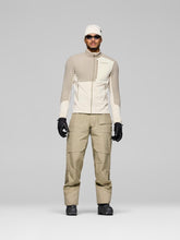 Load image into Gallery viewer, Person wearing a beige and white jacket with matching pants on a gray background
