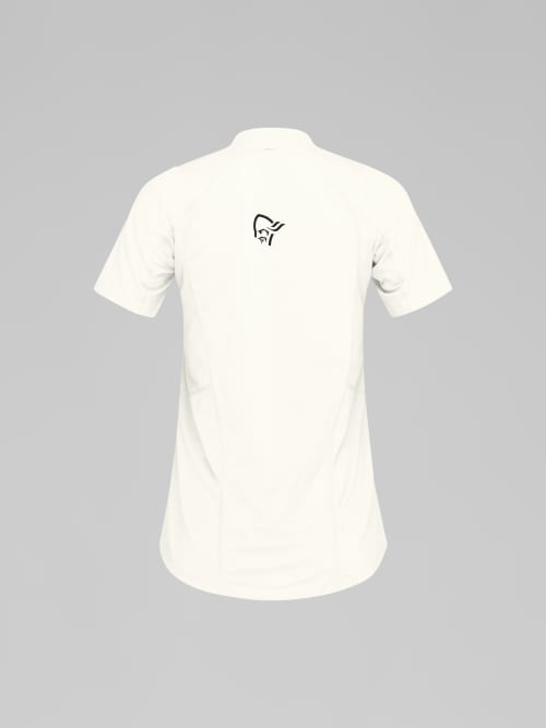 White t-shirt with a small black logo on the chest against a gray background