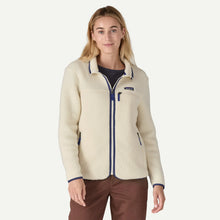 Load image into Gallery viewer, Woman wearing a cream-colored jacket with blue accents on a white background