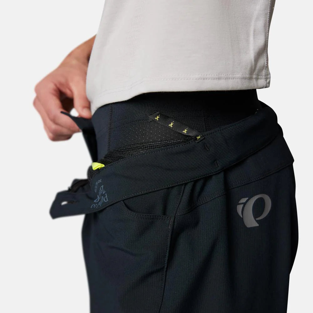 Black cycling pants with a brand logo on a white background