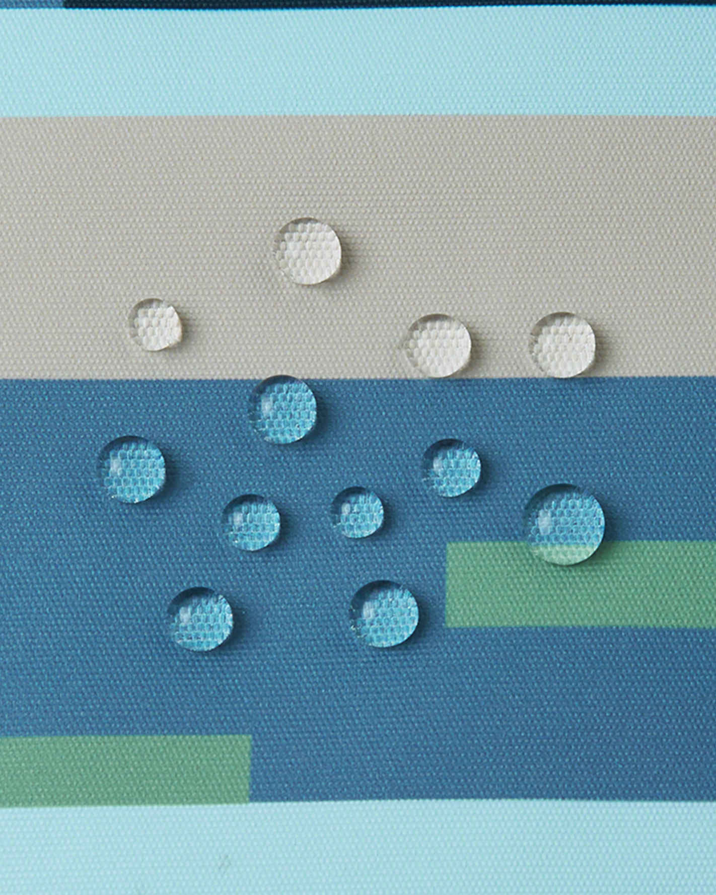 Textured surface with circular patterns in various shades of blue and gray.