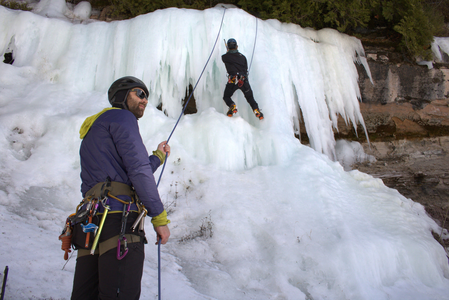 Climbing guides Colin Rosium & David Hixembaugh tackling some ice on Grand Island in Munising, MI