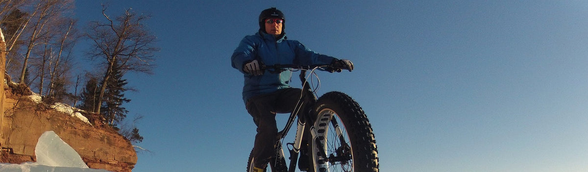 Down Wind Sports owner Todd king riding his fat bike on the ice of Lake Superior near Marquette in the Upper Peninsula