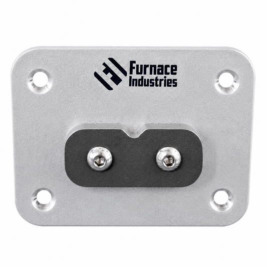 Metal mounting plate with Furnace Industries logo on a white background