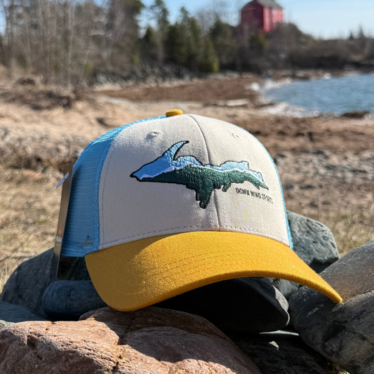 Cap with a logo on a stone wall
