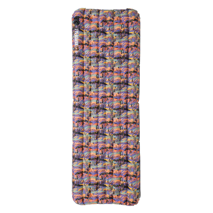 Multicolored inflatable camping mattress on a white background