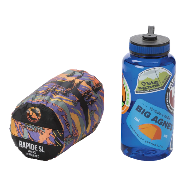 Multicolored sleeping bag and blue water bottle with Big Agnes logo on a white background