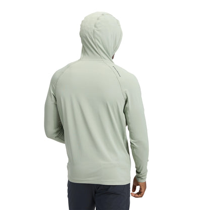 Light gray hoodie worn by a person on a white background