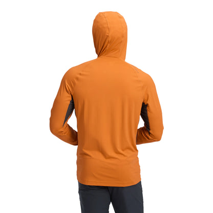 Orange hoodie worn by a person on a white background