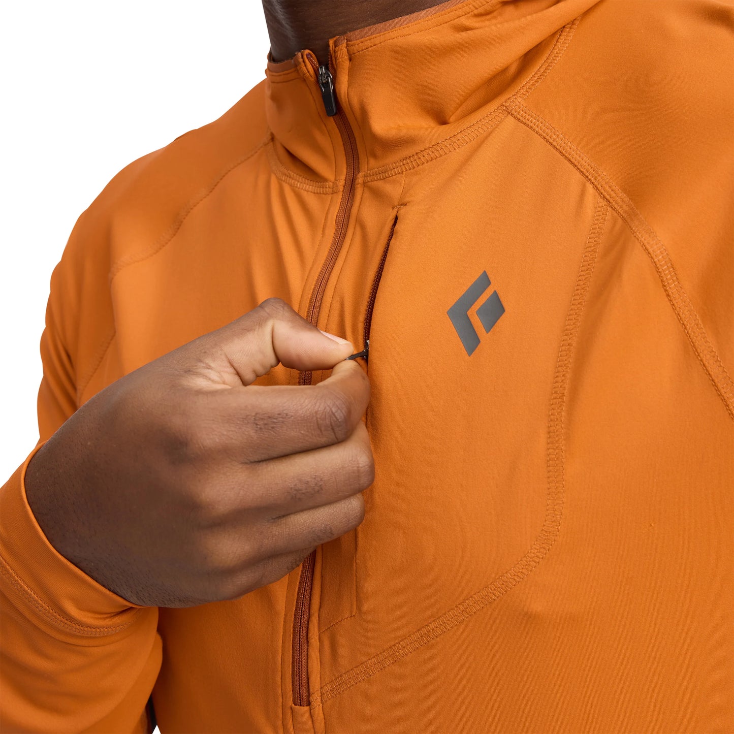 Orange jacket with a brand logo on a white background
