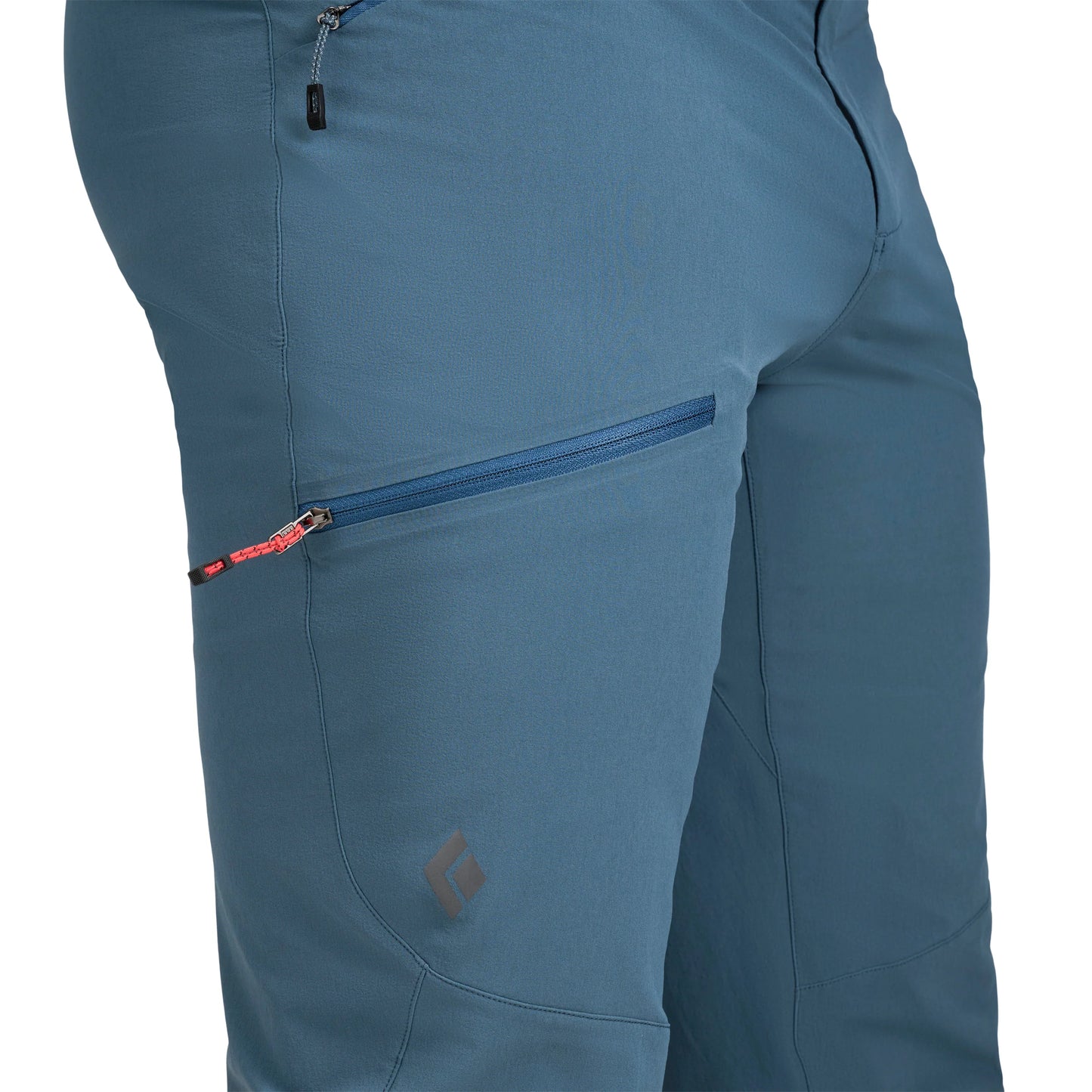 Blue pants with a zipper pocket on a white background