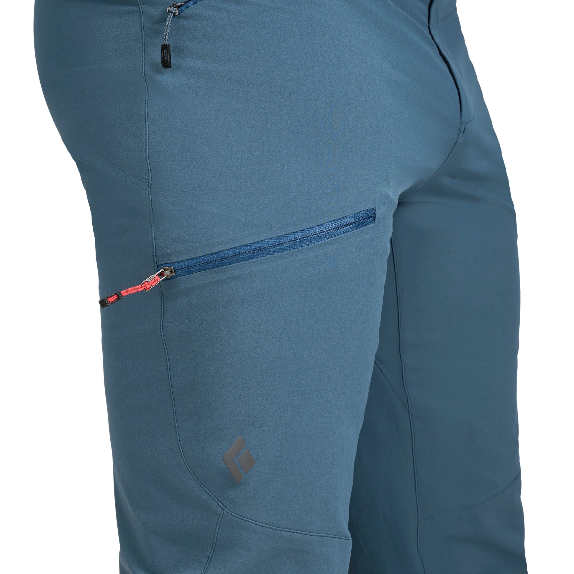 Blue pants with a zipper pocket on a white background