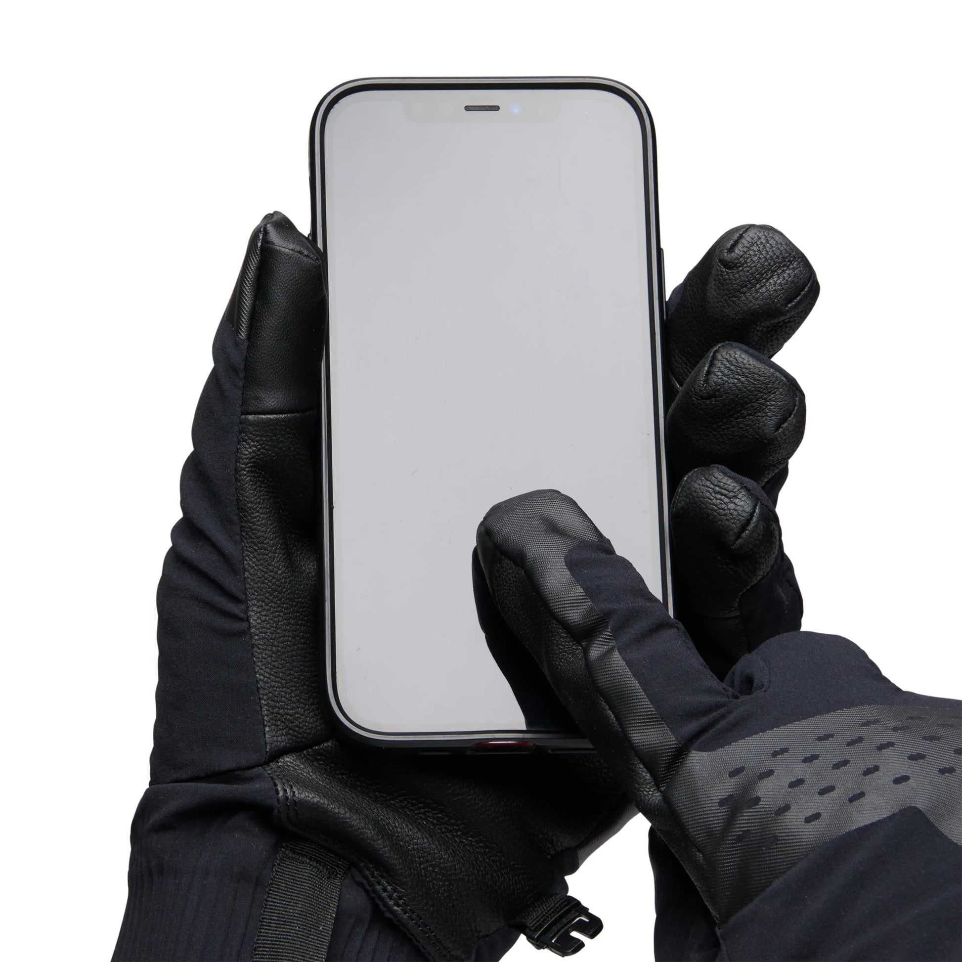 Person wearing black gloves holding a smartphone on a white background