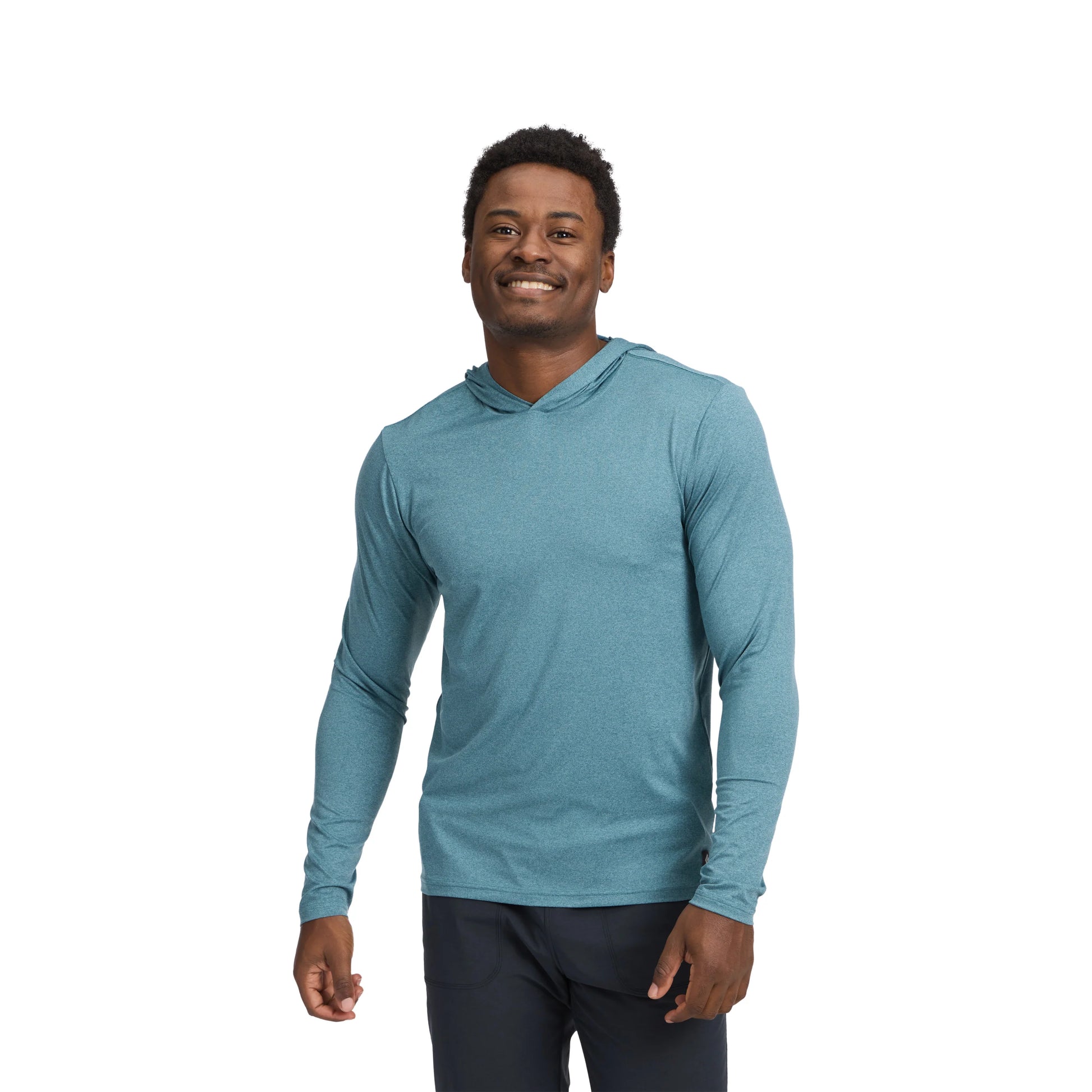 Man wearing a blue long-sleeve shirt on a white background
