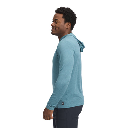 Man wearing a blue hoodie on a white background