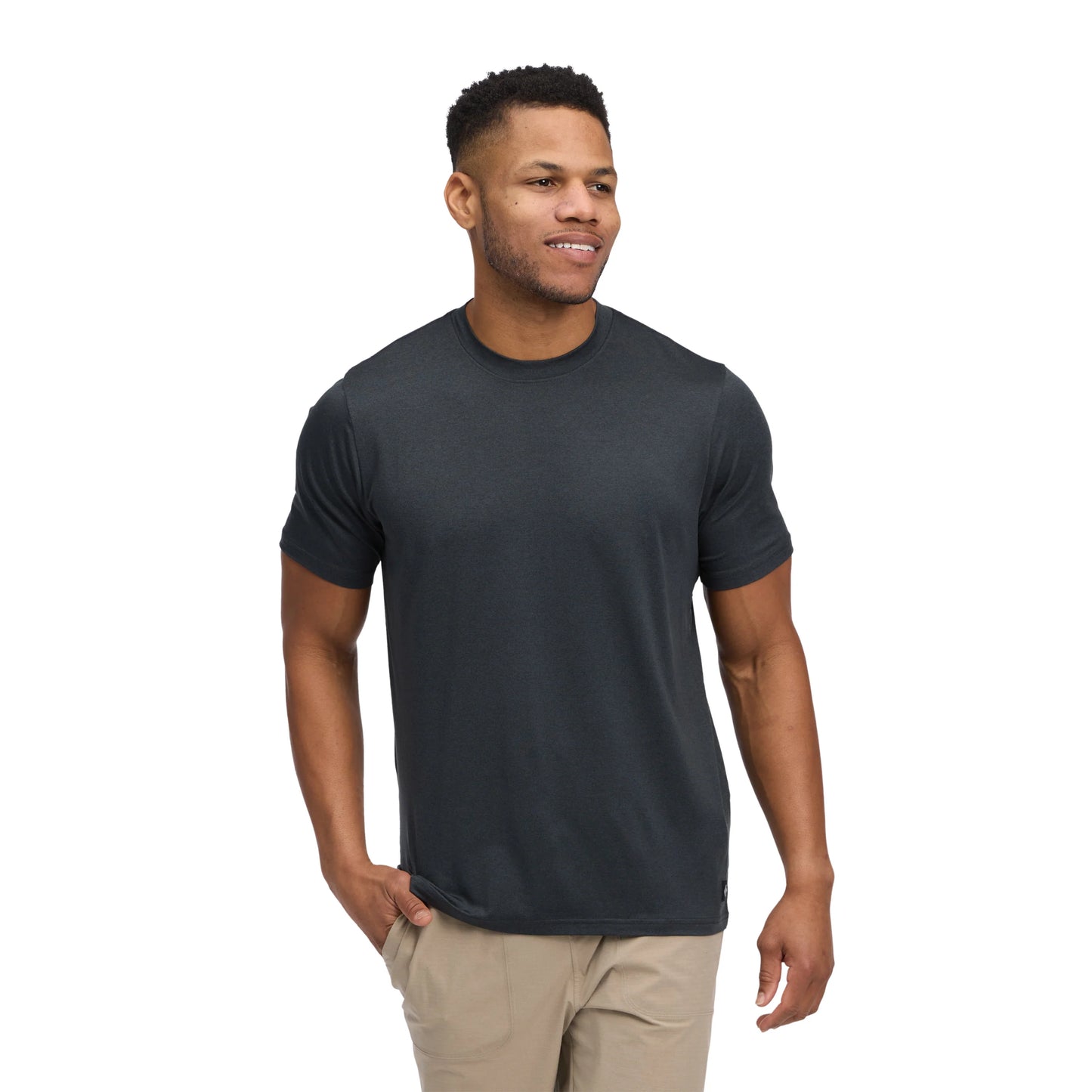 Man wearing a dark gray t-shirt on a white background