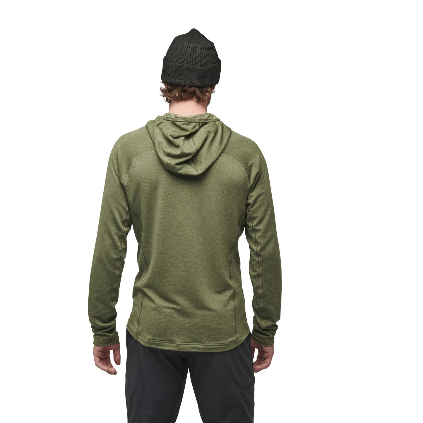 Person wearing a green hoodie and black beanie on a white background