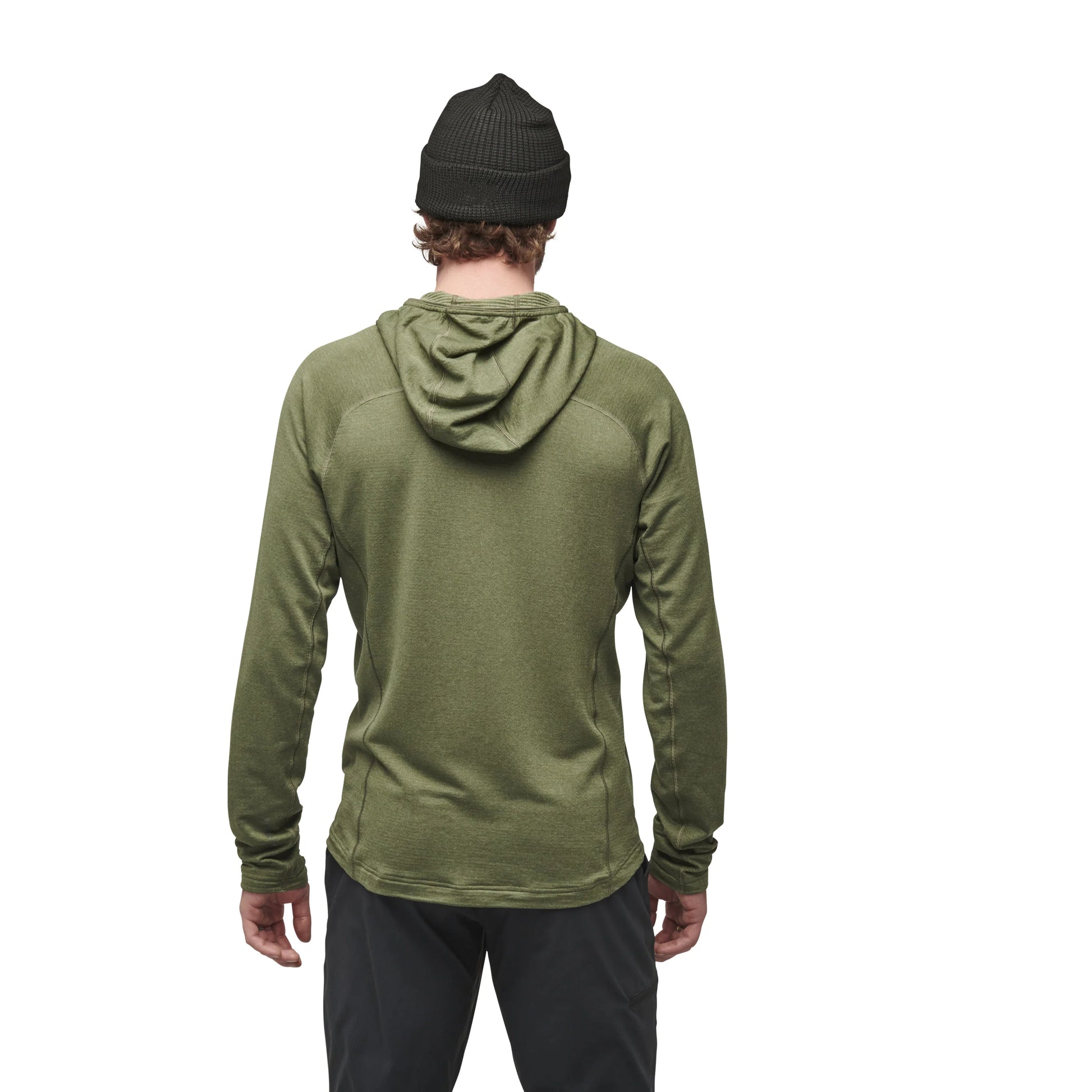 Person wearing a green hoodie and black beanie on a white background