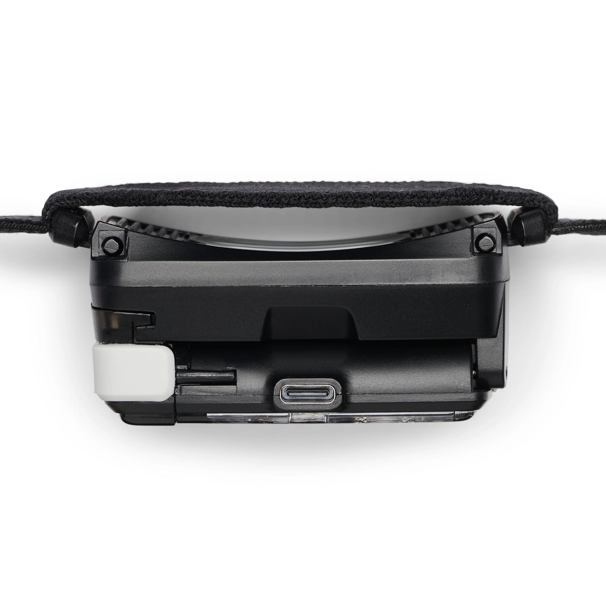 Headlamp charger port on white background