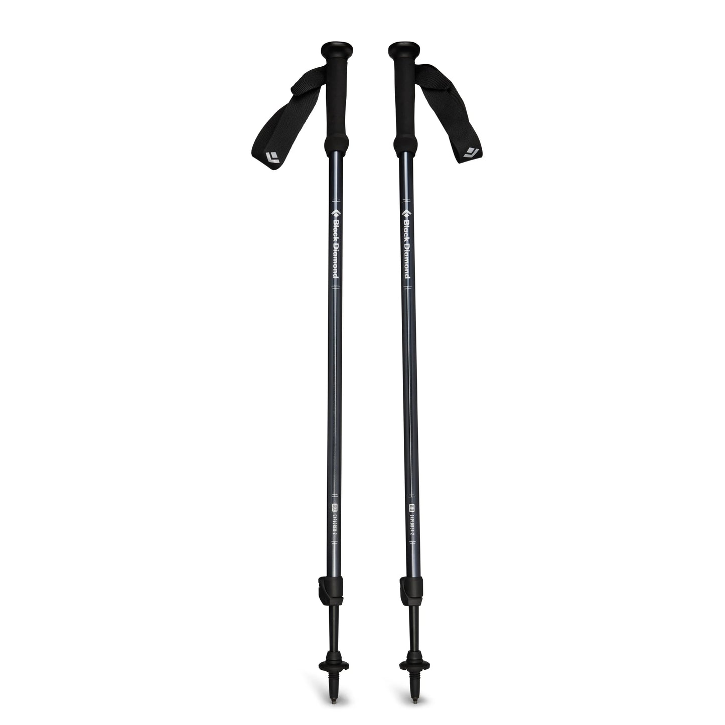 Two black hiking poles on a white background