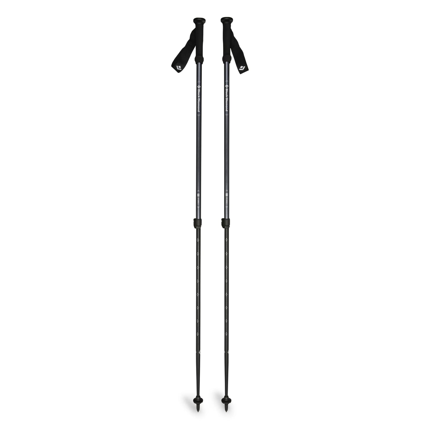 Two black hiking poles on a white background