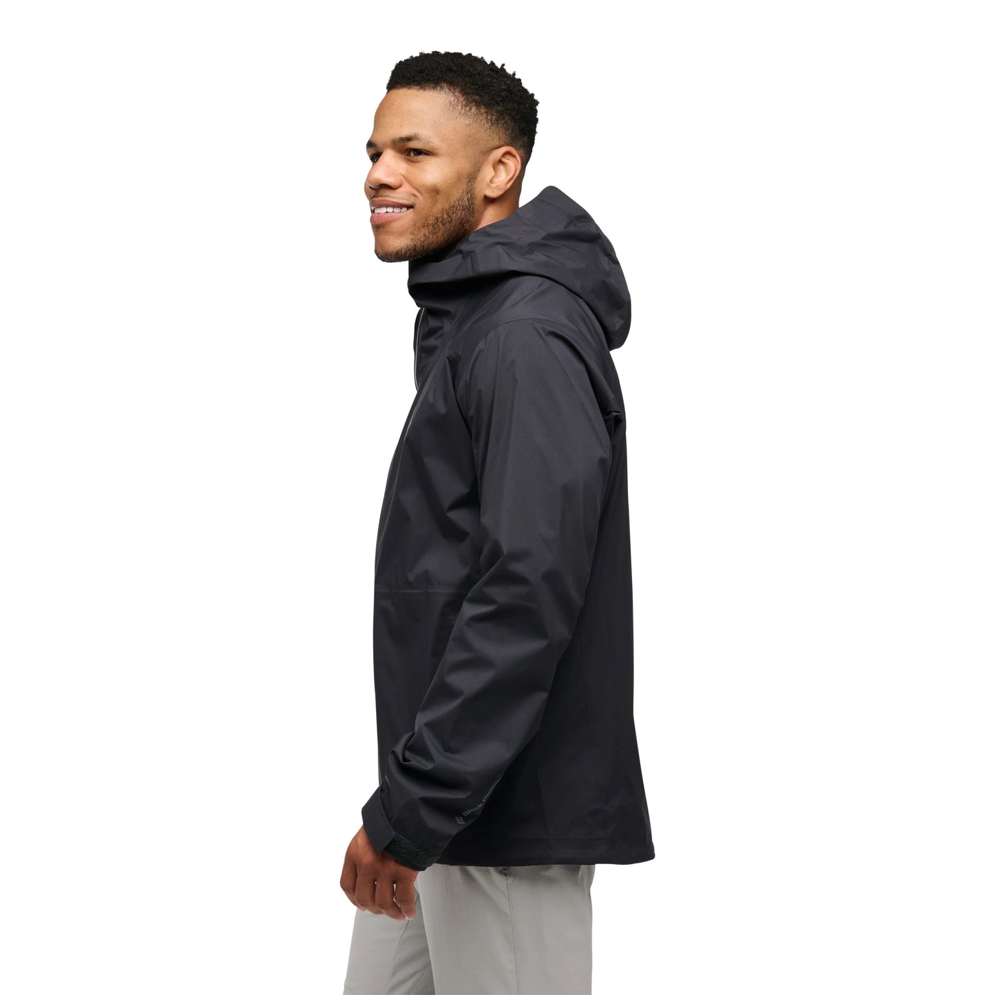 Man wearing a dark gray jacket on a white background