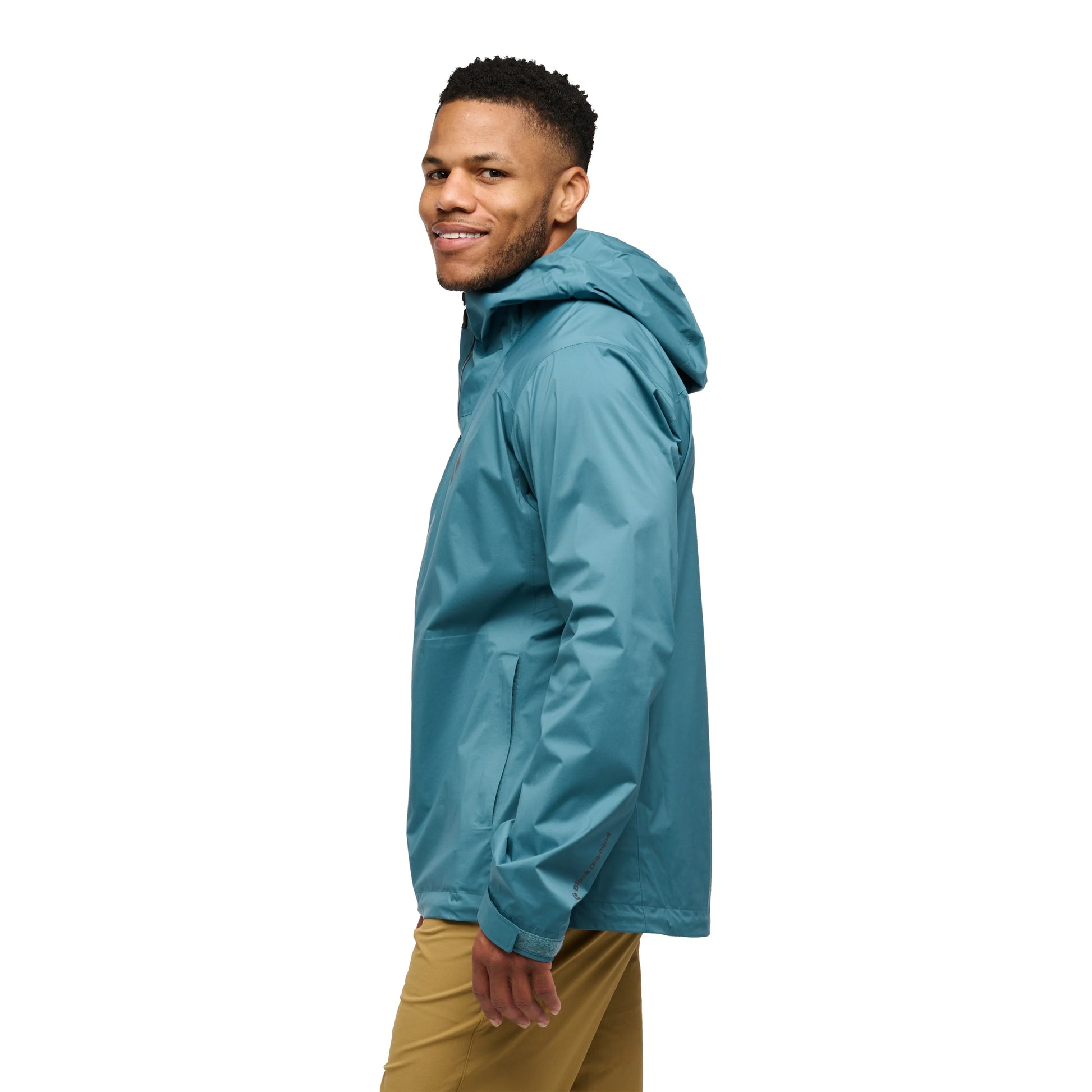 Man wearing a blue raincoat on a white background
