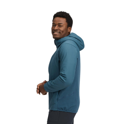 Man wearing a blue hoodie on a white background