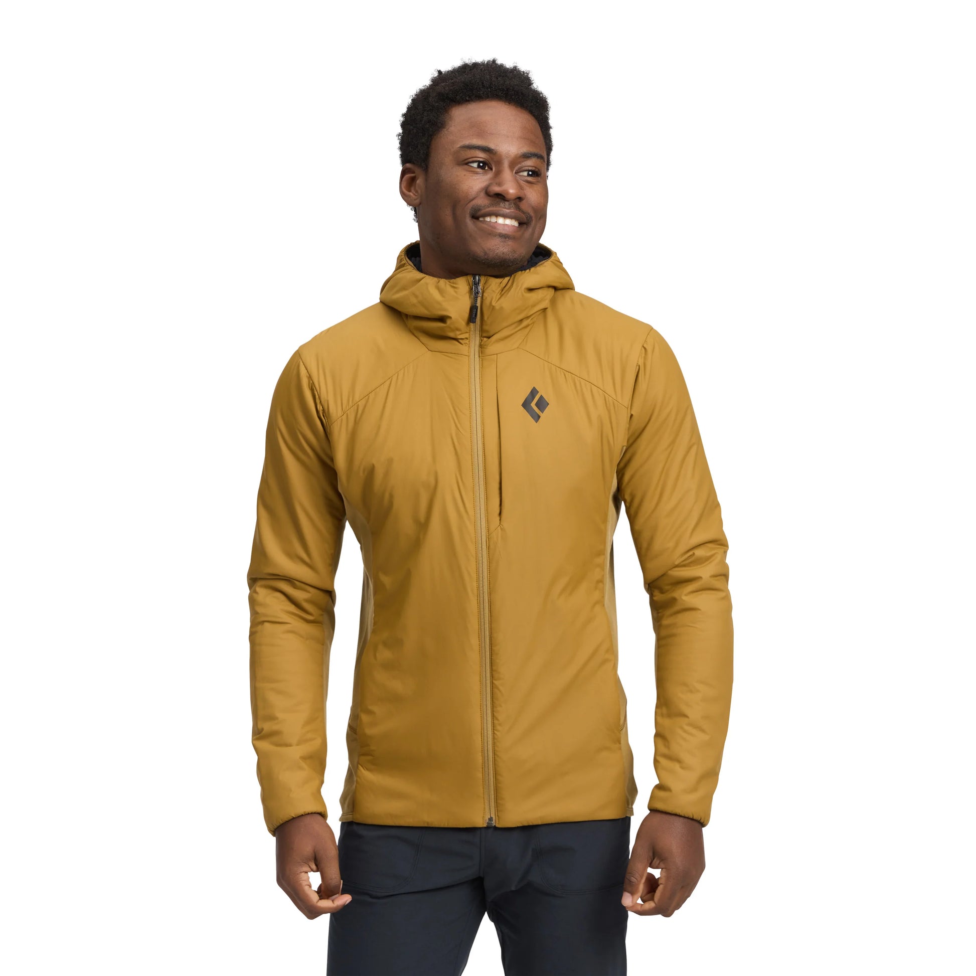 Man wearing a mustard yellow jacket with a brand logo on a white background