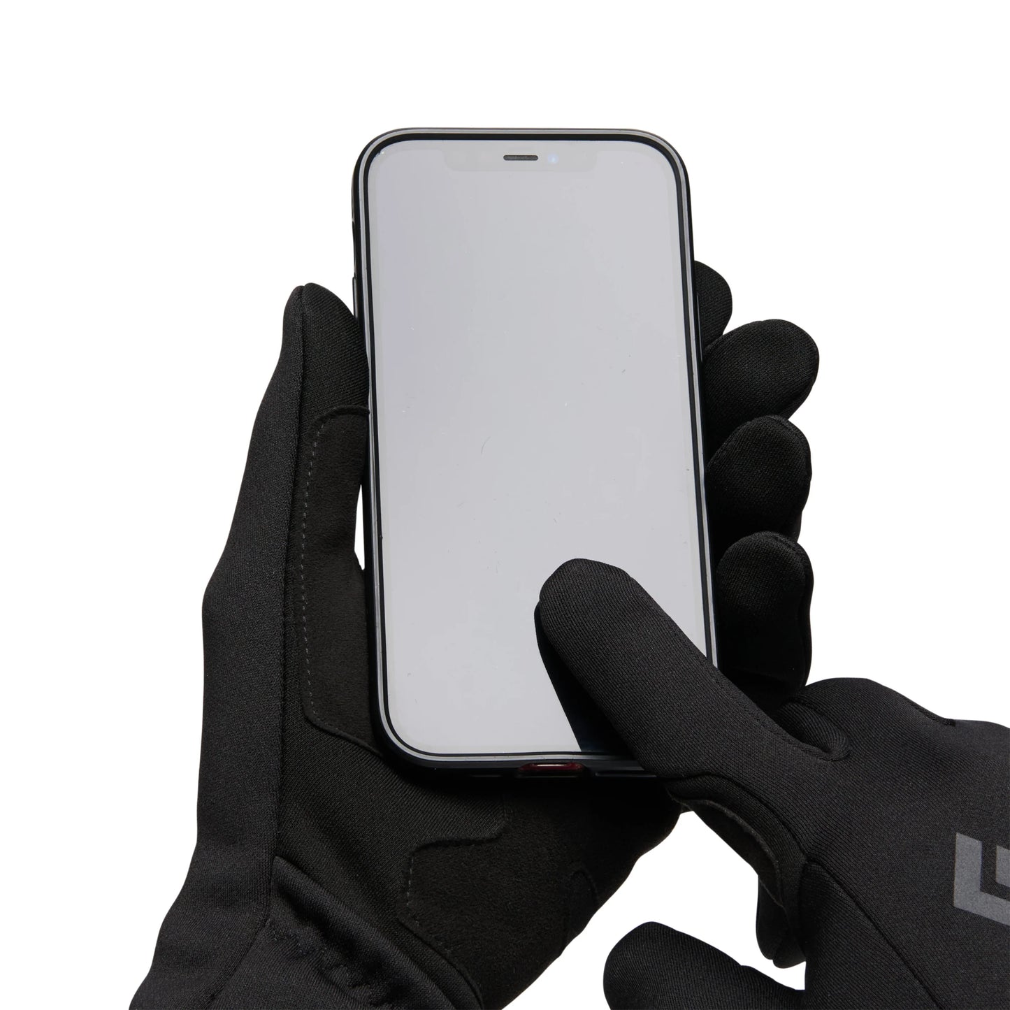 Person wearing black gloves holding a smartphone on a white background