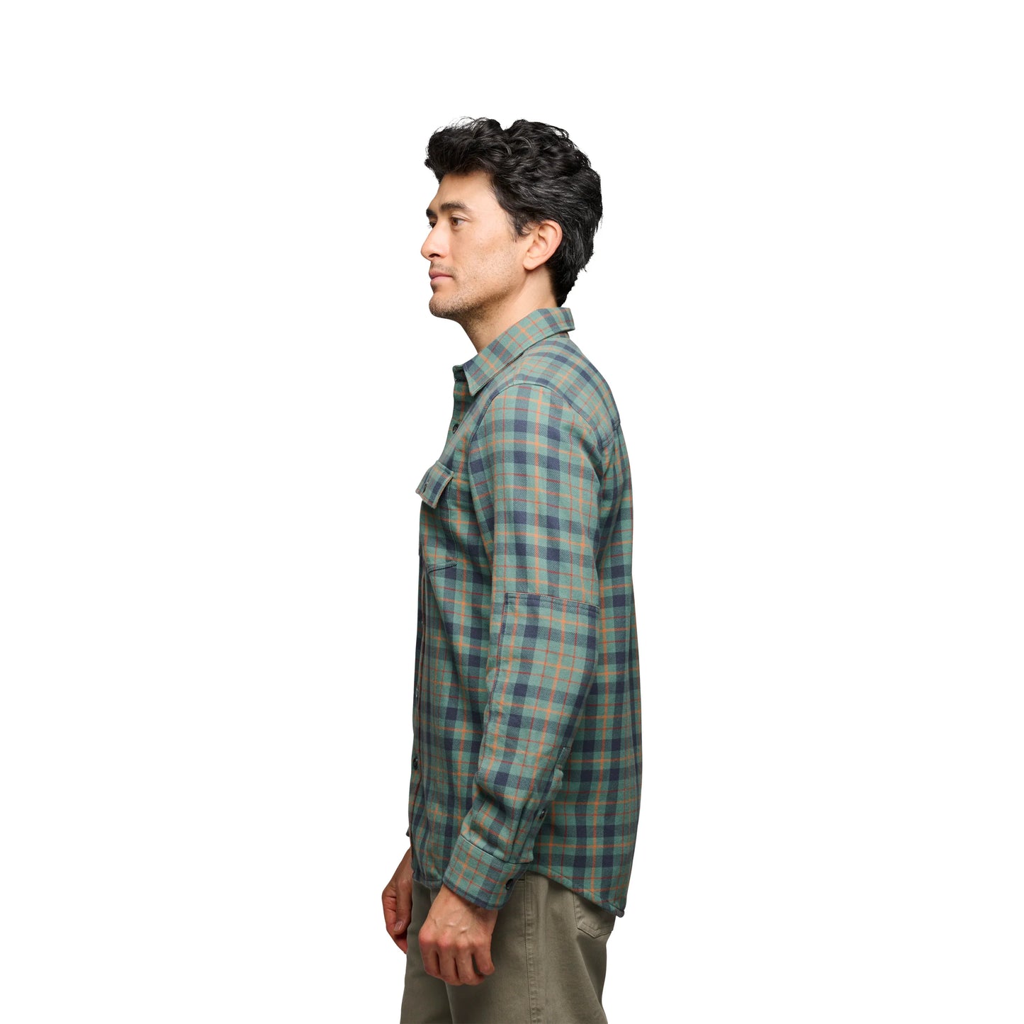 Man wearing a plaid shirt on a white background