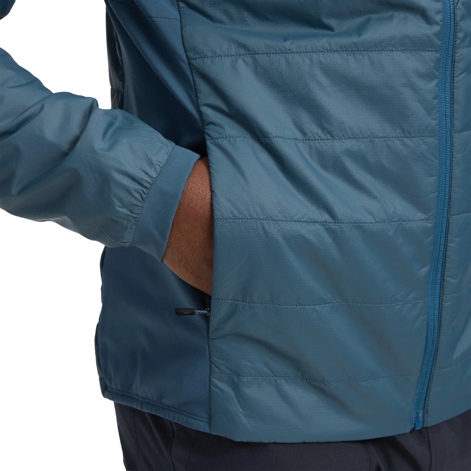 Blue jacket with a focus on the sleeve and chest area