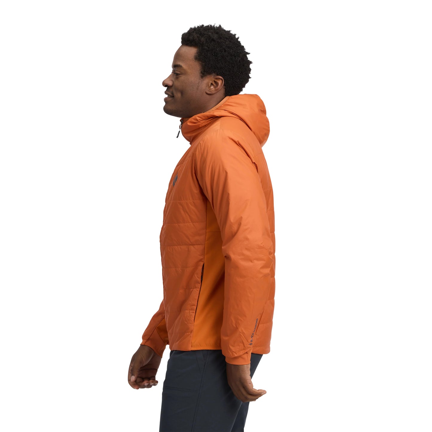 Person wearing an orange jacket on a white background