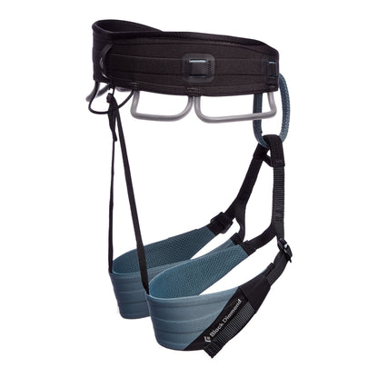 Climbing harness with black straps and blue waistband on a white background