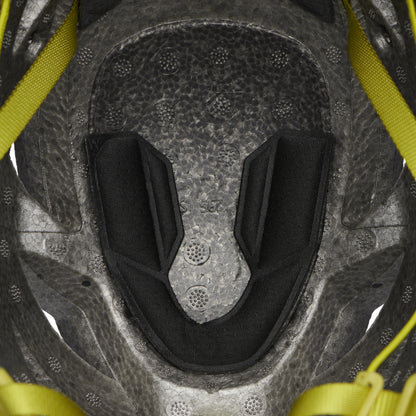 Close-up of a helmet interior with black padding and yellow straps.
