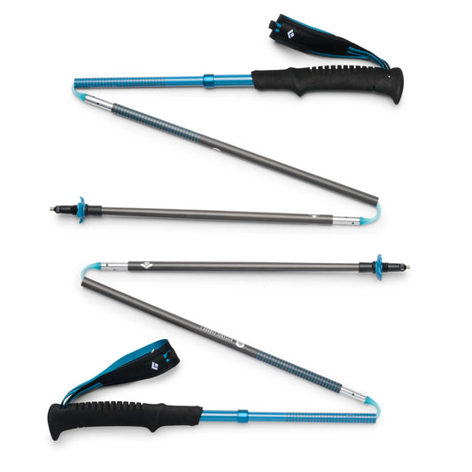 Set of telescopic hiking poles with blue accents on a white background