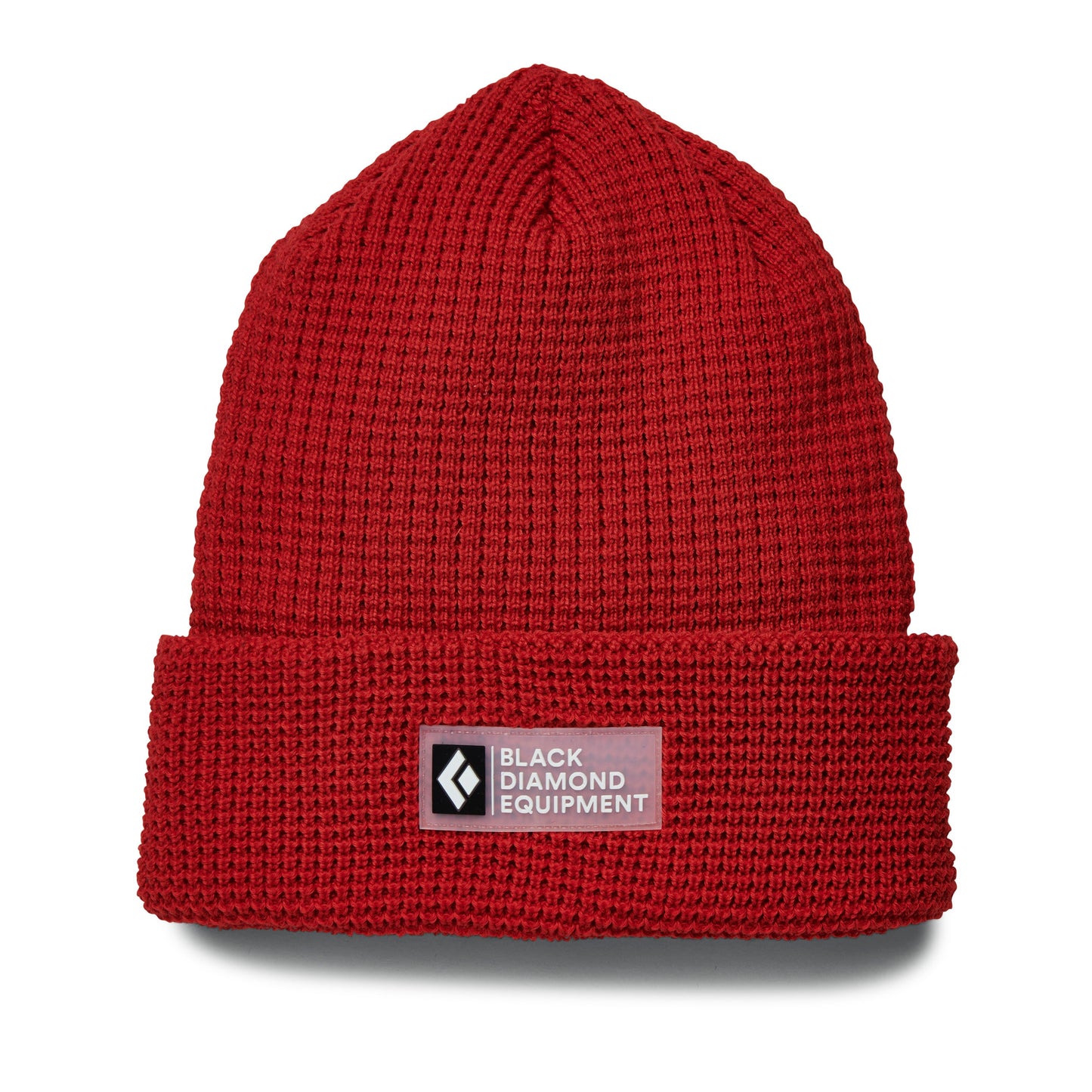 Red knit beanie with Black Diamond Equipment logo on a white background