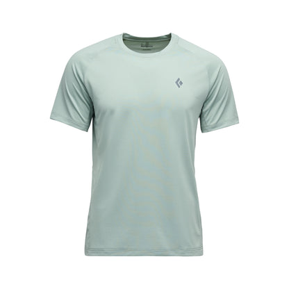Light green t-shirt with a small logo on a white background
