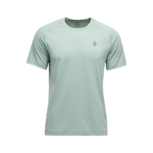 Light green t-shirt with a small logo on a white background