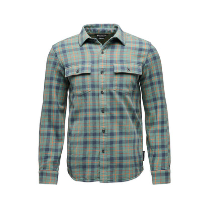 Plaid shirt with green and blue pattern on a white background