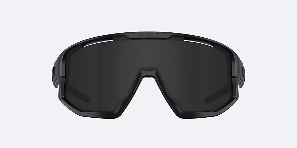 Black goggles with dark lenses on a light gray background