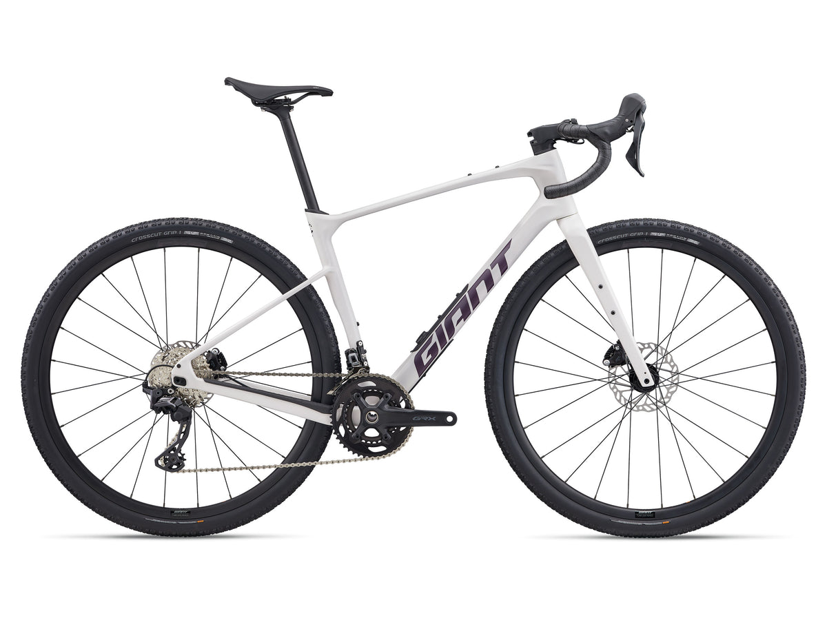 White bicycle with black wheels on a white background