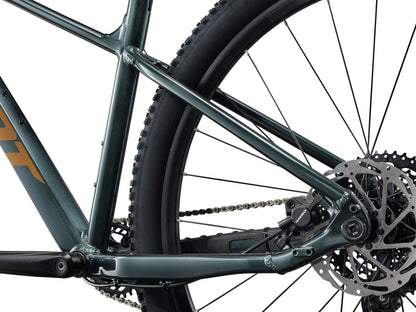 Close-up of a bicycle's chain mechanism on a white background