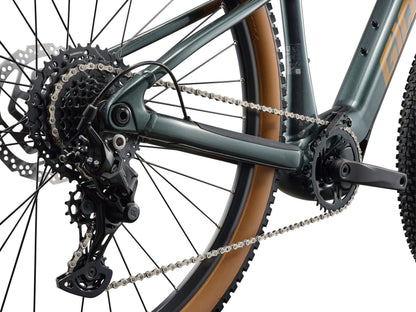 Close-up of a bicycle's gear system on a white background