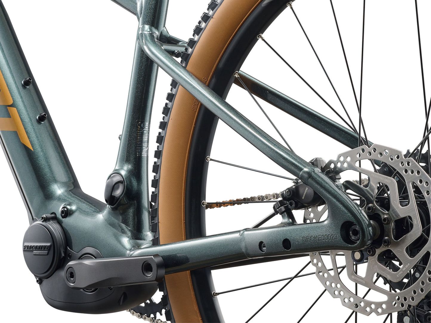 Close-up of a bicycle's chain mechanism and gear system.